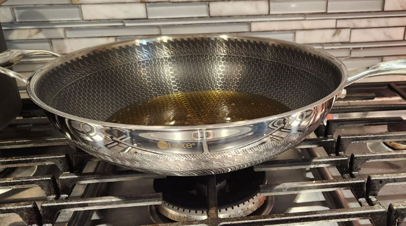 tips for using induction cookware on a gas stove